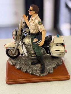 Vanmark Motorcylcle Sheriff Figure comes with Certificate of Authenticity it is Rare and Unique.