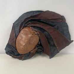 Handcrafted Leather Wall Art – Mask Sculpture