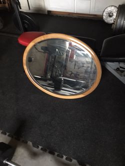 Large heavy oval mirror