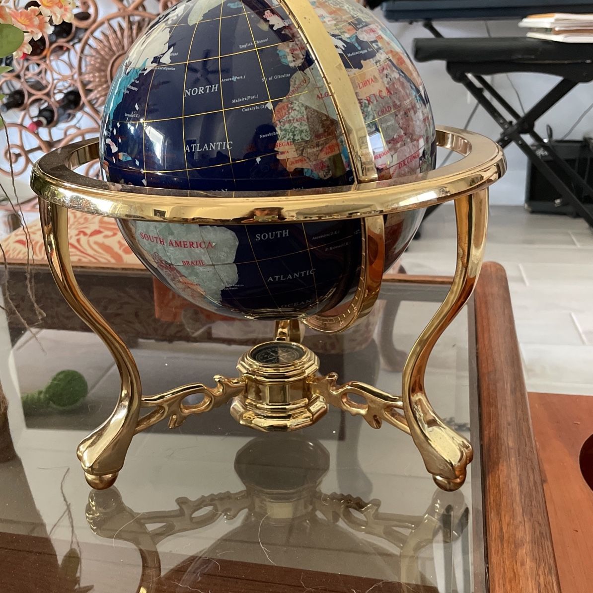Marble Like World Globe with semi precious stones and a Compass below