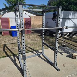 Bodysolid power rack+300 lbs plates+barbell