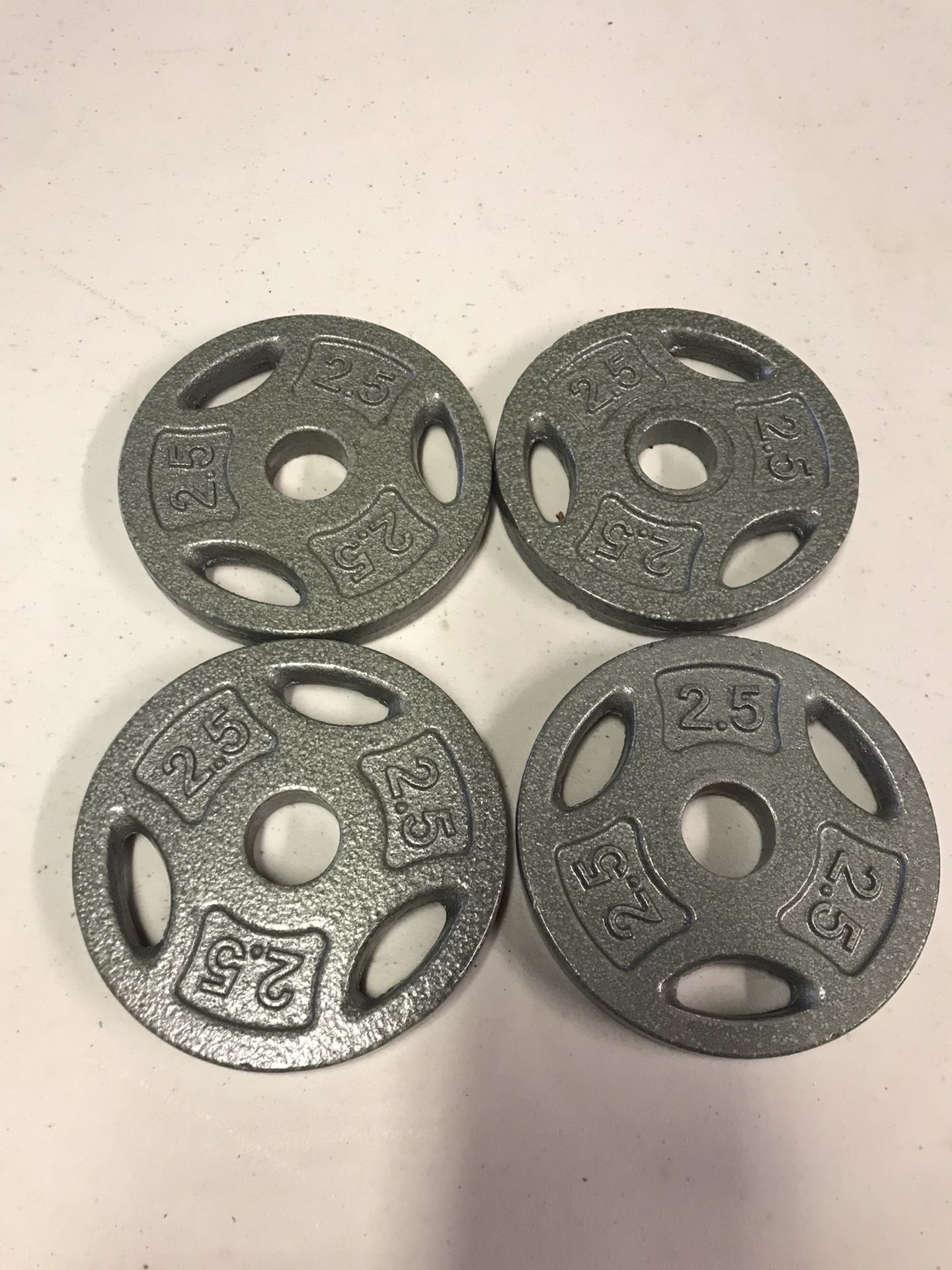 4 Brand New 2 1/2 Lb Weight Plates, 1”