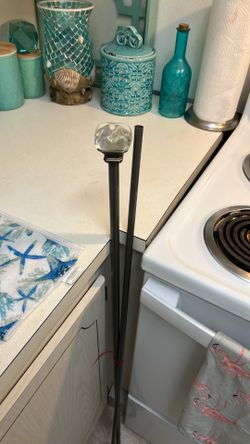 Gray metal curtain rod