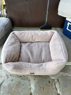 Used Dog Bed In Good Condition!  Soft Pink Color.  For medium Sized Dog.