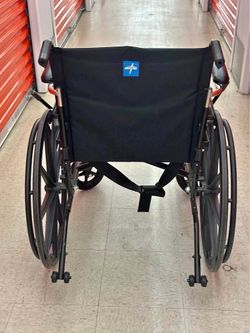 Brand New Transporter Chair with wheels