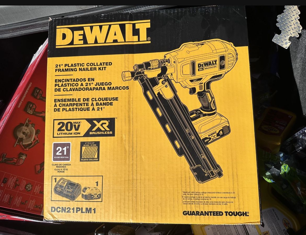 Dewalt Xr Brushless Framing Nail Gun With 5ah battery, charger, and bag
