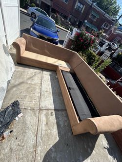 L shape couch with bed inside