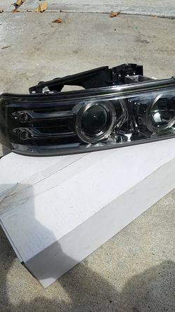 1999 Chevy Suburban front headlight kit never installed comes in box