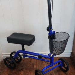 KNEE SCOOTER/WALKER.   BLUE FRAME, DUAL BRAKES, WIRE BASKET, WIDER FRONT/LARGER TIRES. EXCELLENT CONDITION!