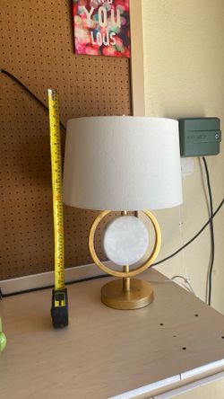 Lamp with gold accents