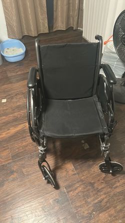 Black Manual Wheelchair with Cushion