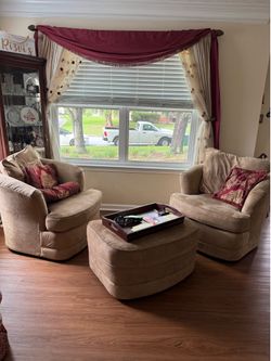 2 suede swivel chairs with ottoman
