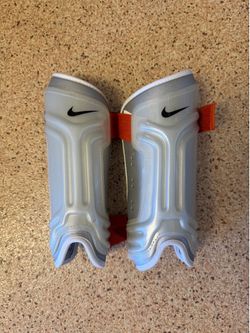 Nike Soccer Shin Guards (Metallic Silver / Orange Straps)