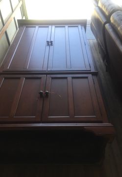 Armoire and real leather reclining sofa