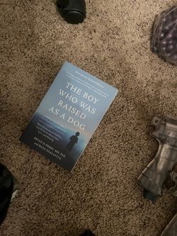 The boy who was raised as a dog book