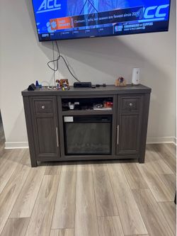 Grayish Brown Entertainment Center with Electric Fireplace