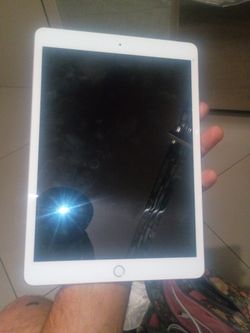 ipad a2200( charging port has to be replace soldierd)