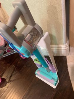 Kids vacuum toy with attachments and stand