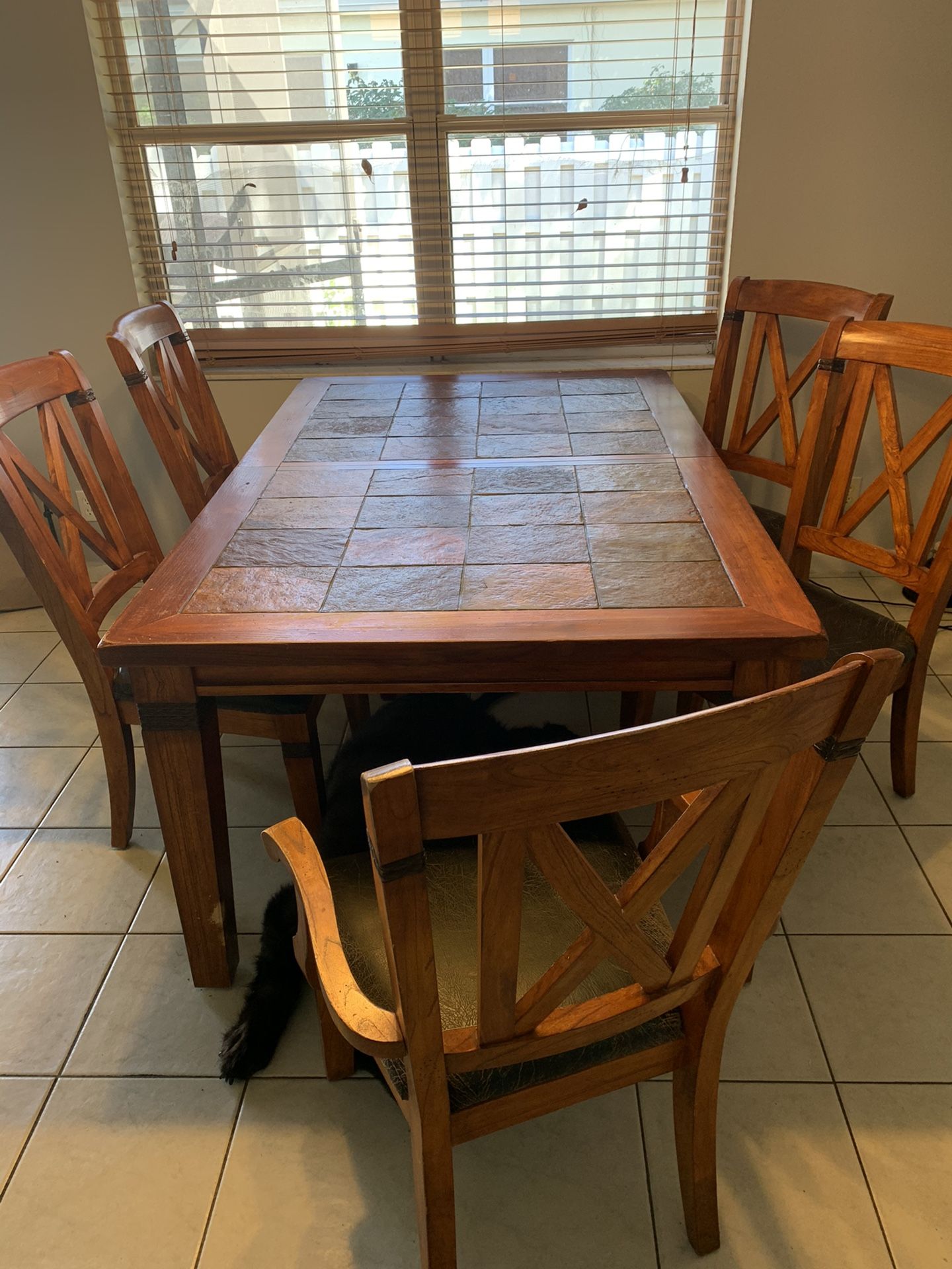 Rustic hardwood dining table with 5 chairs