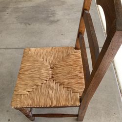 Whiker Table Chairs  with wood construction. 