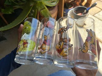 4 Disney glass cups