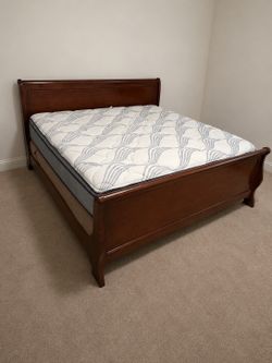 Cherrywood king sleigh bed frame only