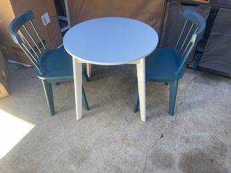small table with two chairs for children