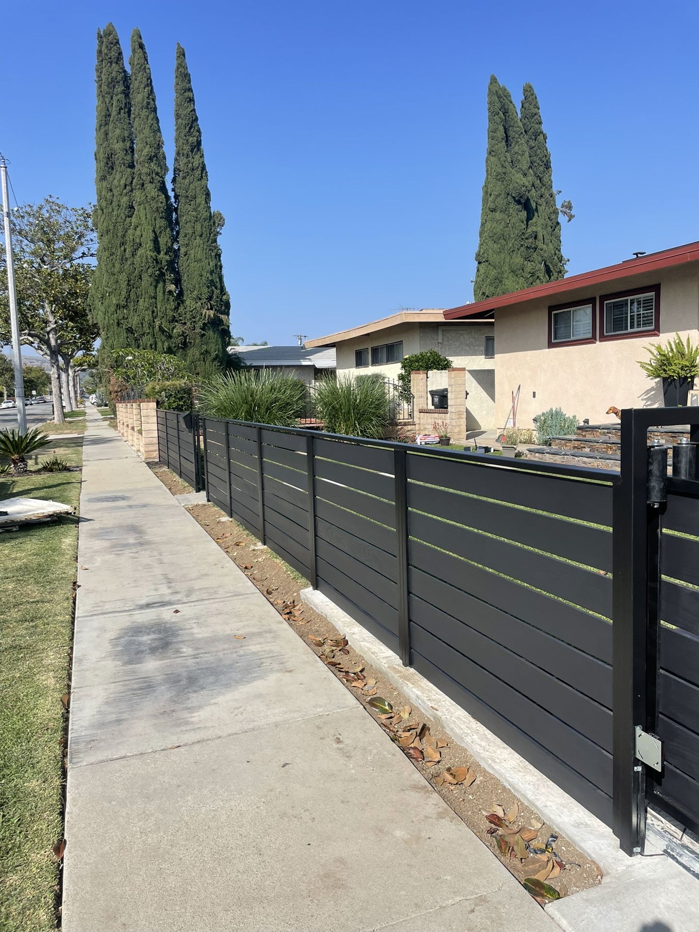 Front Yard Black Redwood Fence
