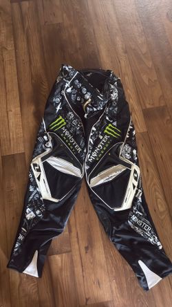Defcon Monster Energy black and white motocross pants with green Monster Energy logo, size 32
