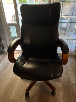 Black high-back leather executive office chair