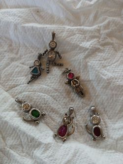 Six charms ... 5.00 dollars each