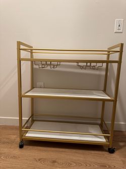 White and gold bar cart