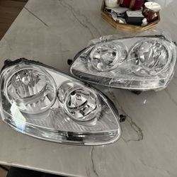 05-10 VW Jetta Chrome Headlight Set