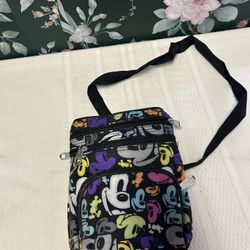 Disney Parks Exclusive Mickey Mouse Colorful Pop Art Crossbody Bag with five zip pockets