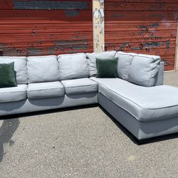 Ashley’s Gray Sectional Sofa Couch with right facing chaise
