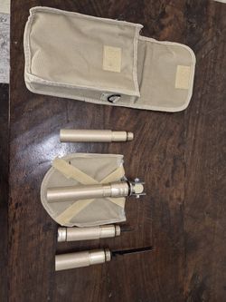 Multi-tool camping military shovel new in package.