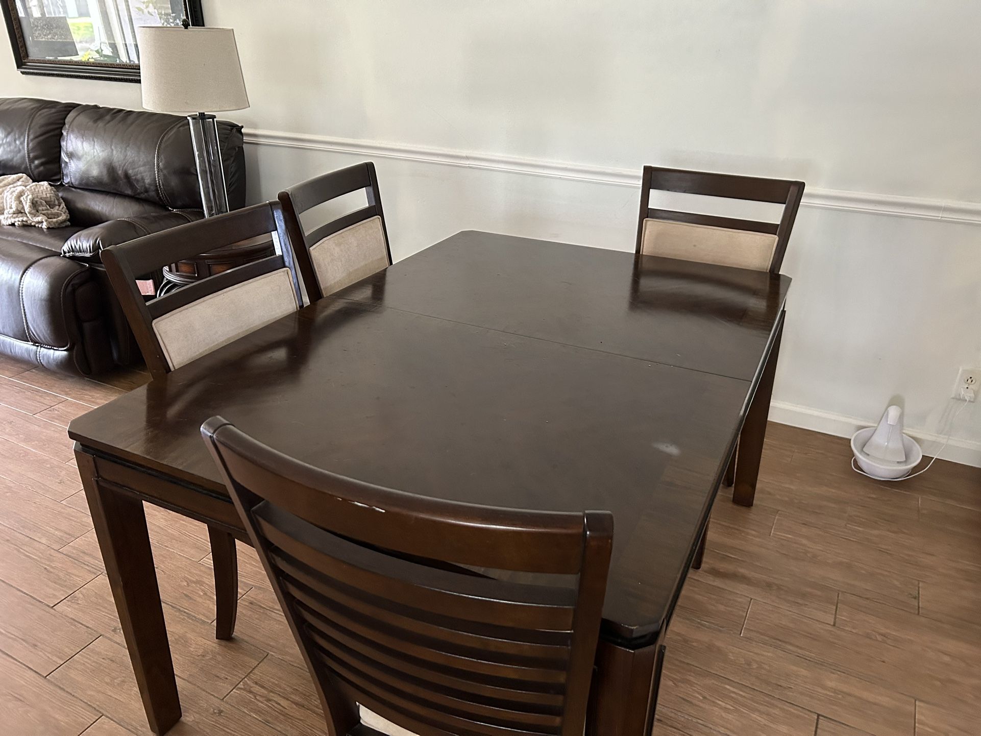 Dining Room Table With Extension And Four Chairs.