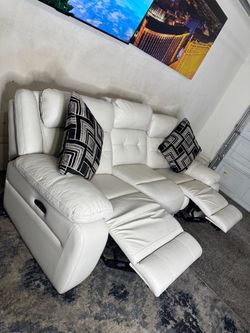 * Like New * Ashley Furniture white genuine, leather electric recliner ( Free Delivery )