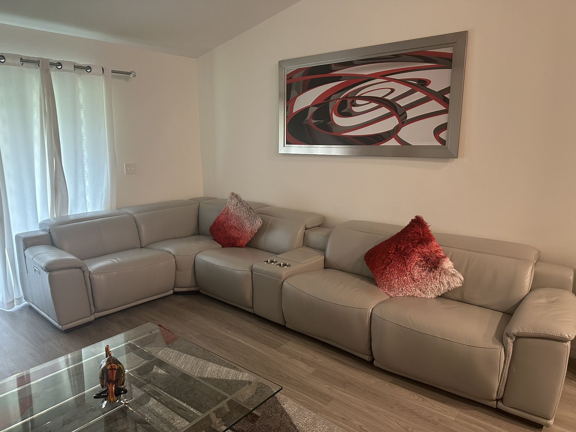 Gray Leather Sofa. All Reclainers