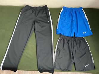 Nike set of athletic pants, shorts and bags