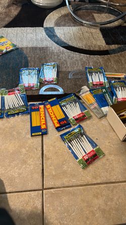 Packs of pens and pencils