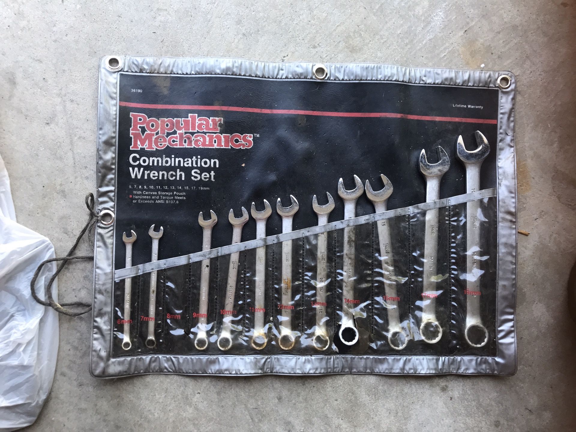 Popular Mechanics Combination Wrench Set - There are 11 total, the 8mm is missing. They are in good condition, but the case is pretty worn. Please se