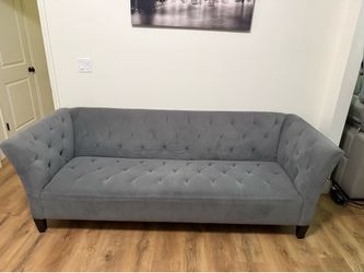 Grey velvet sofa