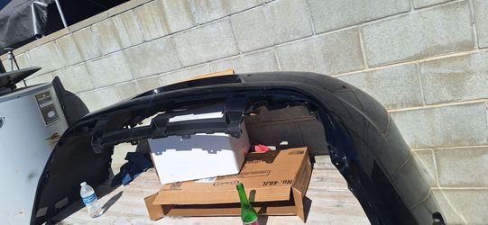 Dodge charger rear bumper cover blak nuw pait
