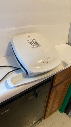 George Foreman grilling machine. In good shape.