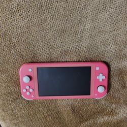 Pink Nintendo Switch Lite With Four Games , Screen Protector And Carrying Case