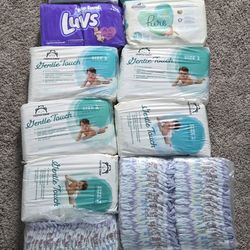 Newborn, size 1, size 2 diapers, and wipes