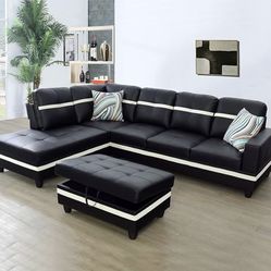 Black leather sectional couch and ottoman