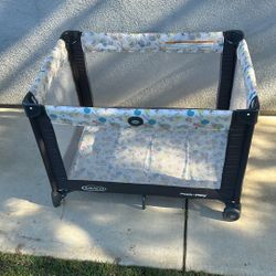 Graco Pack ‘n Play Portable Playard Carnival 