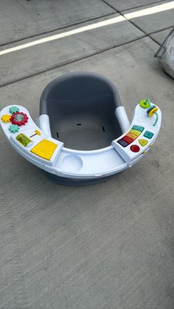 Baby booster seat with activity center